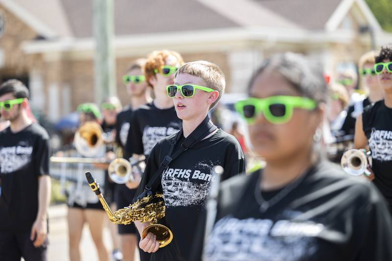The Rock Falls High School marching band makes their way through the Fiesta Days parade Saturday, Sept. 14, 2024.