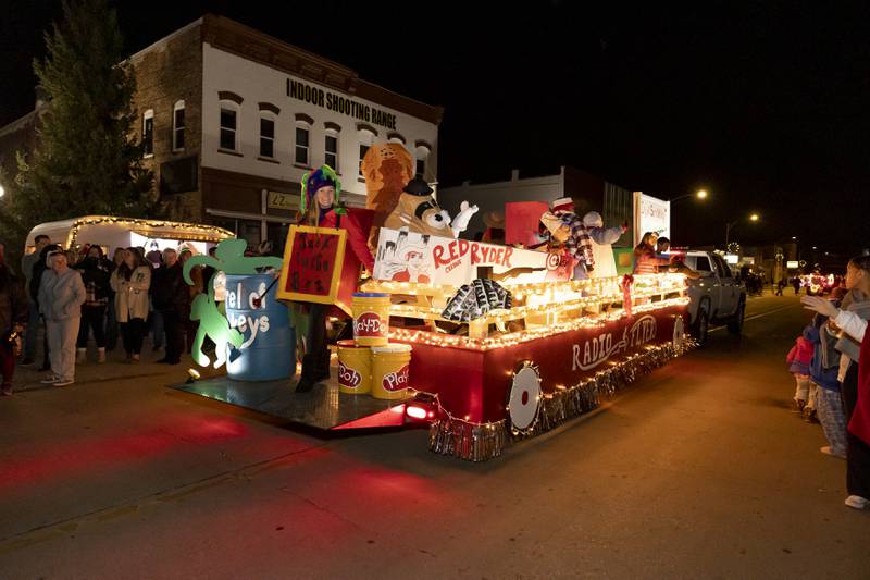The city of Spring Valley float at the Lighted Christmas Parade on Saturday, Nov. 26, 2022, noted some classic favorites to find under the Christmas tree.
