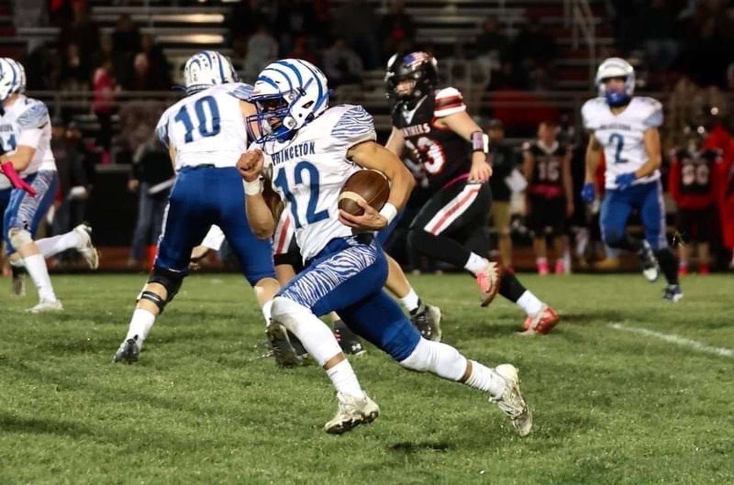 Princeton's Kaydin Gibson breaks loose for one of his two long, fourth-quarter touchdowns in Friday night at Prophetstown. The Tigers won 61-14.