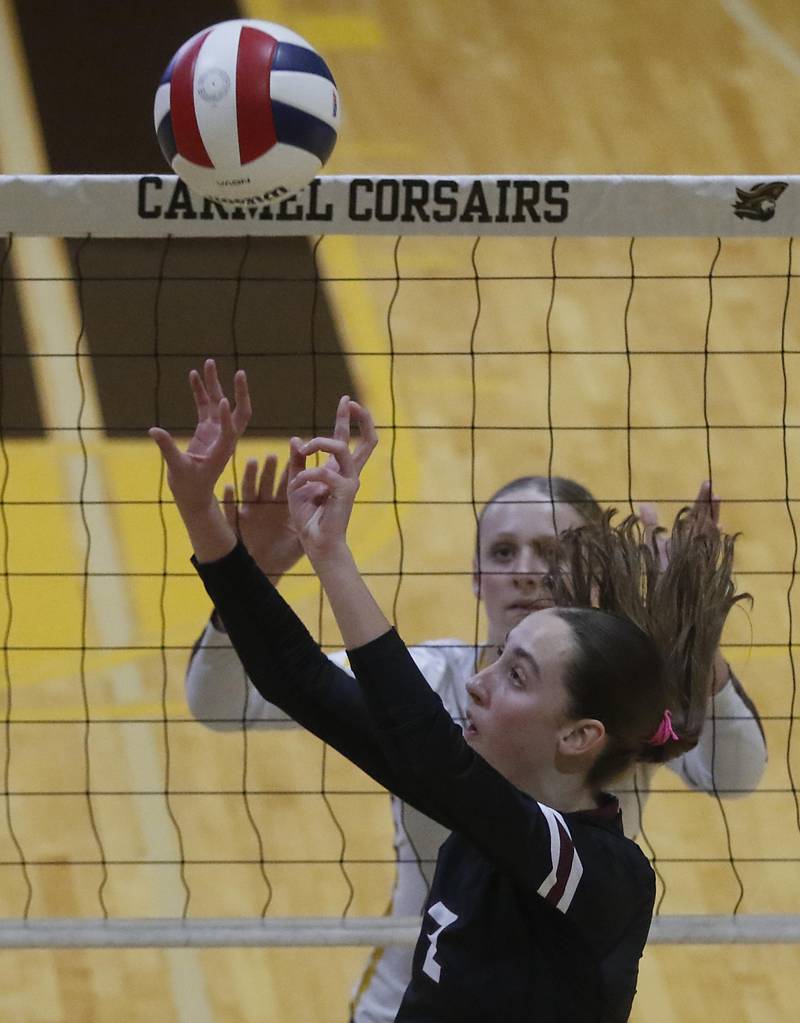 Prairie Ridge's Addison Smith sets the ball during the IHSA Class 3A Carmel Sectional championship volleyball match against Carmel on Thursday, Nov. 6, 2025, at Carmel High School, in Mundelein.