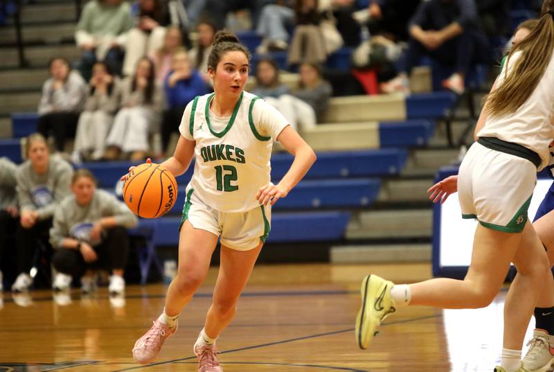 York’s Ellie Kehoe drives toward the basket during a 4A Geneva Regional semifinal game against Geneva on Tuesday, Feb. 18, 2025 in Geneva.