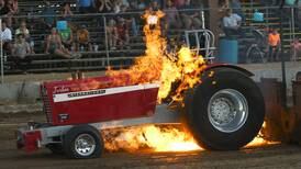 Fiery ride for one contestant at fair’s tractor pull