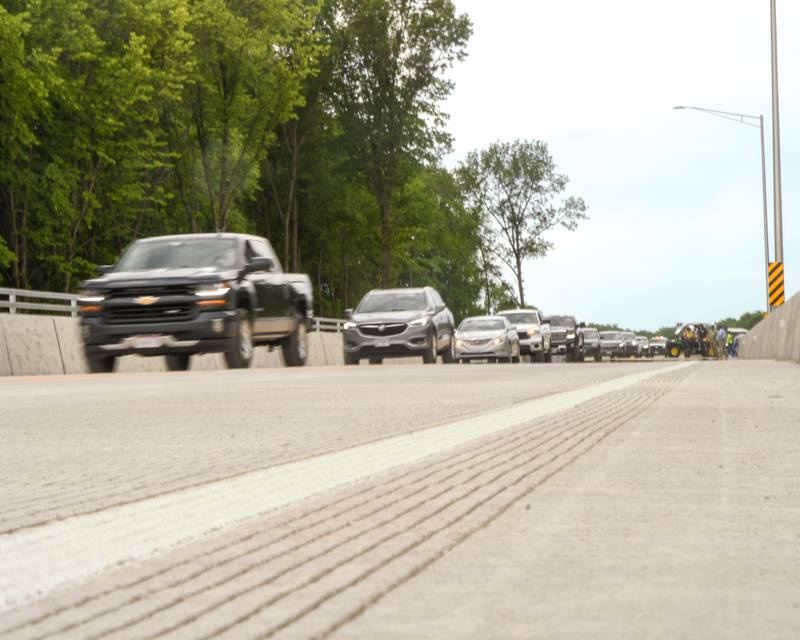 Community members who attended the grand opening of The Fran Klaas Bridge that opened on Wednesday May 2023 that crosses over the Fox River on Eldamain Road between Plano and Yorkville got to try out the new bridge as they left the ceremony.