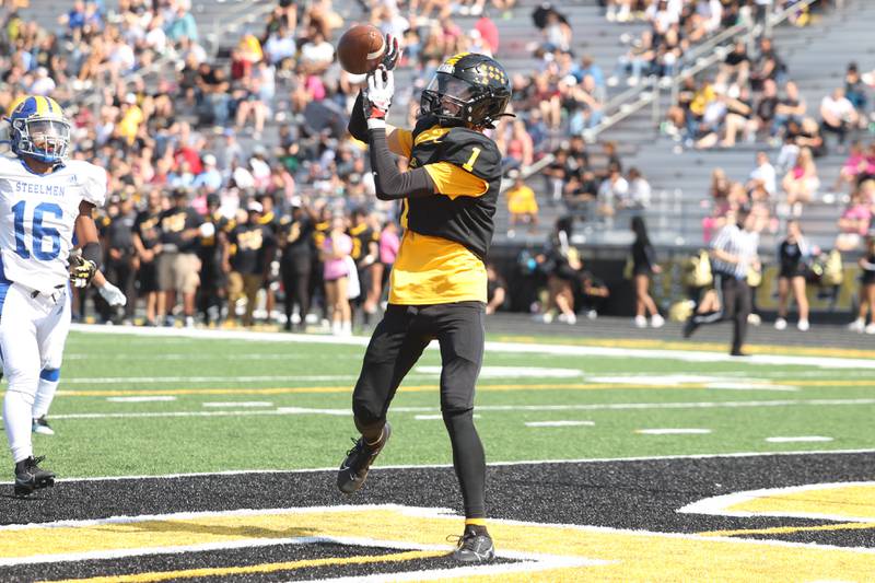 Joliet West’s Ian Farrell pulls in uncontested pass for a score against Joliet Central on Saturday, Sept. 23, 2023 in Joliet.