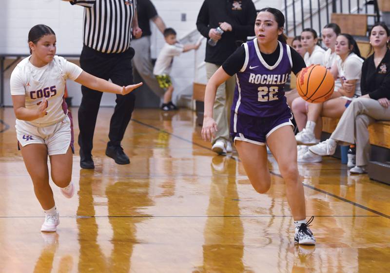 Rochelle's Gianna Olguin (22) brings the ball up the court against Genoa-Kingston at the Oregon Girls Tip-Off Tournament on Wednesday, Nov. 19, 2025  in Oregon.
