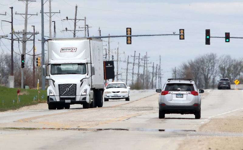 Traffic heads north and south on Peace Road just north of I-88 Tuesday, May 2, 2023, in DeKalb. This stretch of road is going to be widened to four lanes this summer.