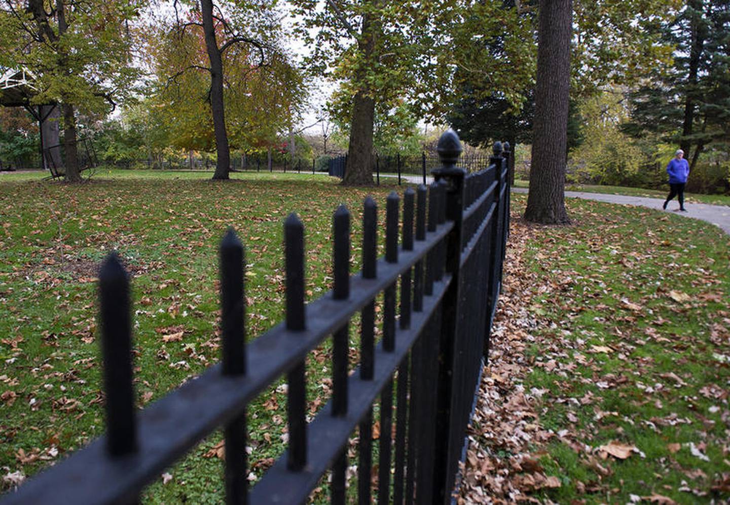 A pedestrian uses the bike path behind the Dillon Home on Tuesday afternoon in Sterling. The city is applying for a grant to join the section with the 2nd Street bike path.