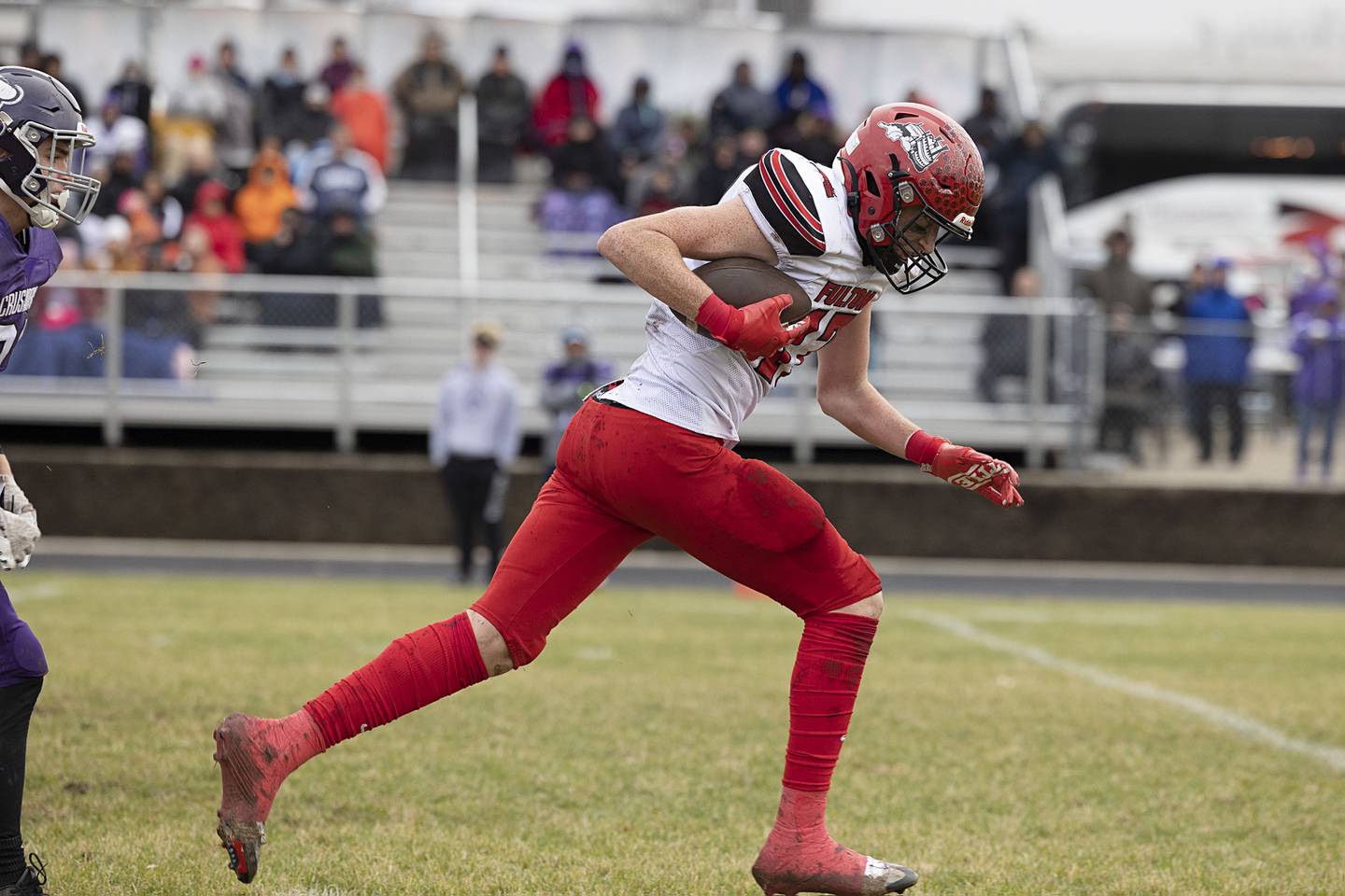 Fulton’s Ethan Price hauls in a catch and gets passed the secondary for a big gain Saturday, Nov. 5, 2022 during a round two football playoff game against Rockford Lutheran.