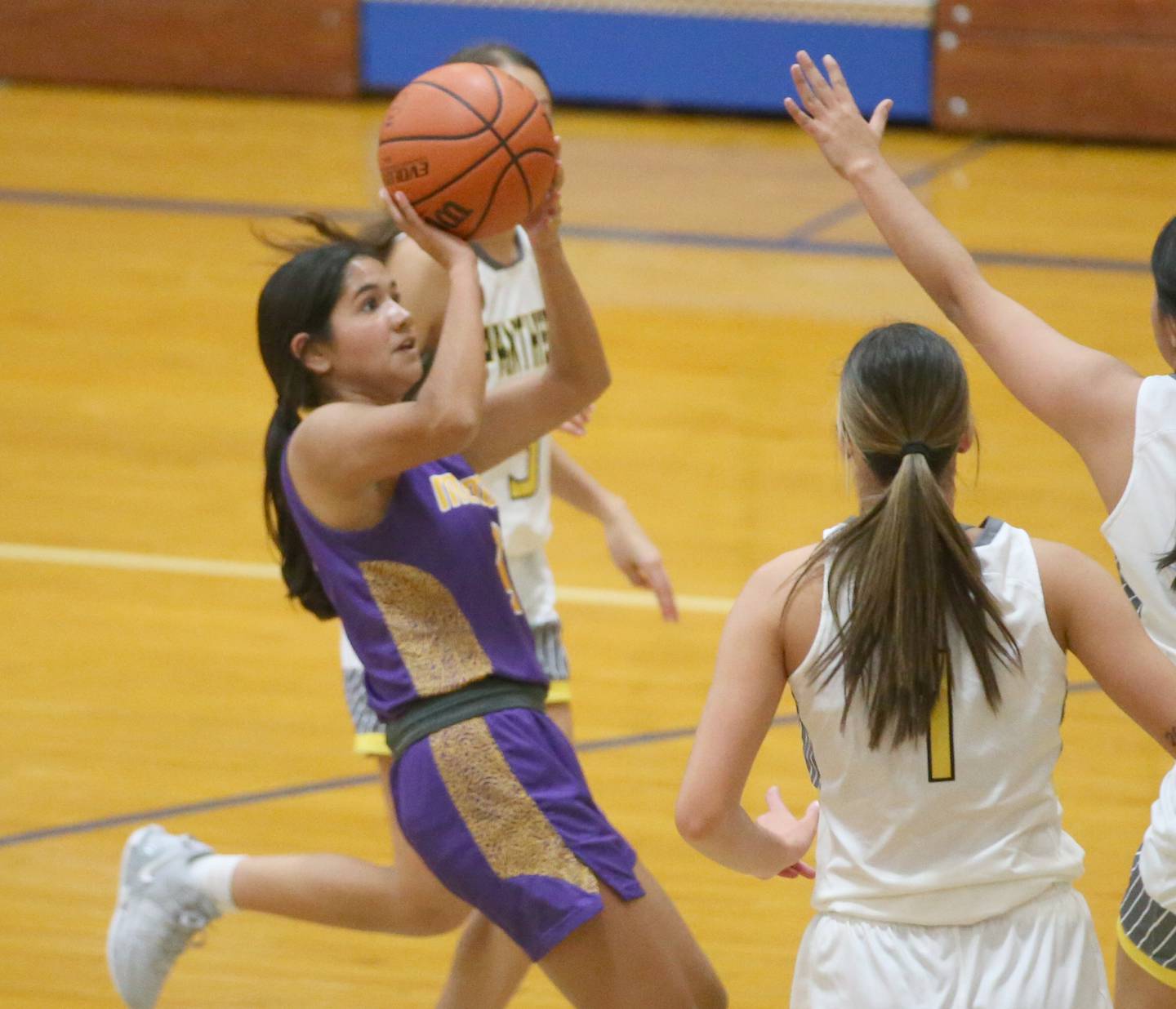 Mendota's Crystal Garcia shoots a jump shot over Putnam County's Ava Hatton during the Princeton High School Lady Tigers Holiday Tournament on Tuesday, Nov. 14, 2023 in Prouty Gym.