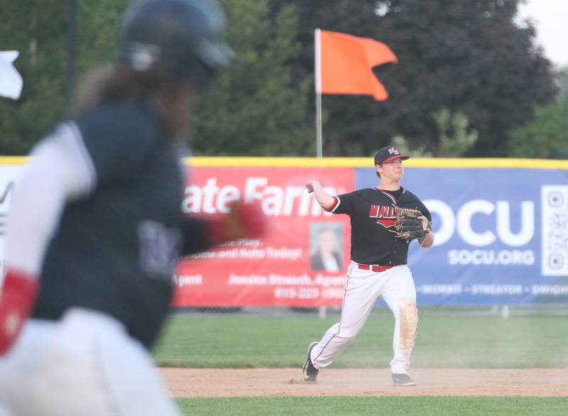 Henry-Senachwine's Evan Culp throws to first base to force out Lexington's Jaxson Hardman during the Class 1A Sectional semifinal game on Wednesday, May 28, 2025 at Schwieckert Stadium in Peru.