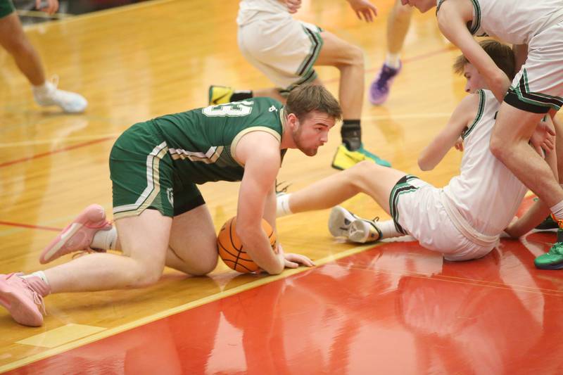 St. Bede's Mason Ross grabs a loose ball against Eureka during the 50th annual Colmone Classic on Monday, Dec. 9, 2024 at Hall High School.