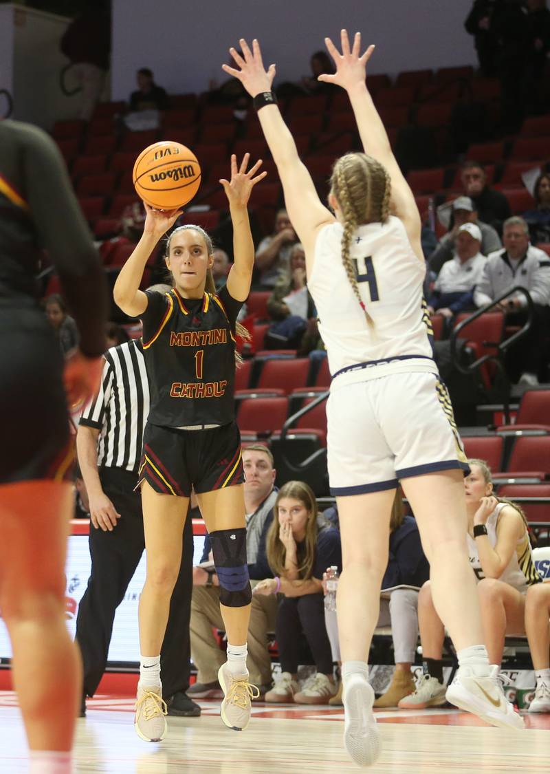 Montini's Nikki Kerstein lets go of a shot over Quincy Notre Dame's Sage Stratton during the Class 3A State semifinal game on Thursday, March 6, 2025 at CEFCU Arena in Normal.