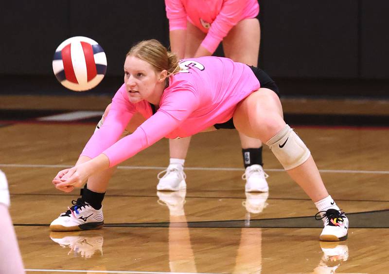 Hiawatha's Madison Krumwiede digs a ball during their match Tuesday, Oct. 15, 2024, at Indian Creek High School in Shabbona.