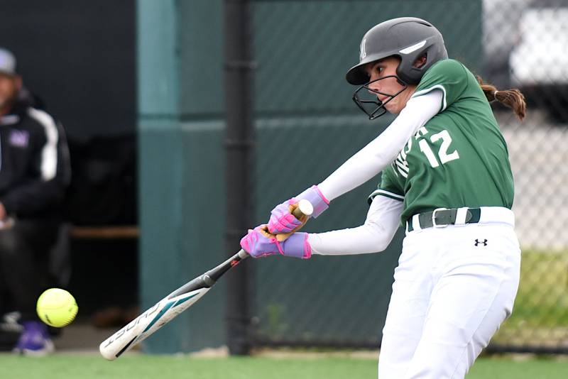 Bishop McNamara's Analeah Ramirez hits a pitch during the Class 2A Coal City Regional semifinals against Manteno Wednesday, May 21, 2025.