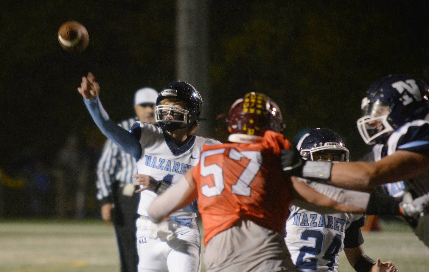 Nazareth's Logan Malachuk passes the ball during their game against Montini Friday Oct 14, 2022.