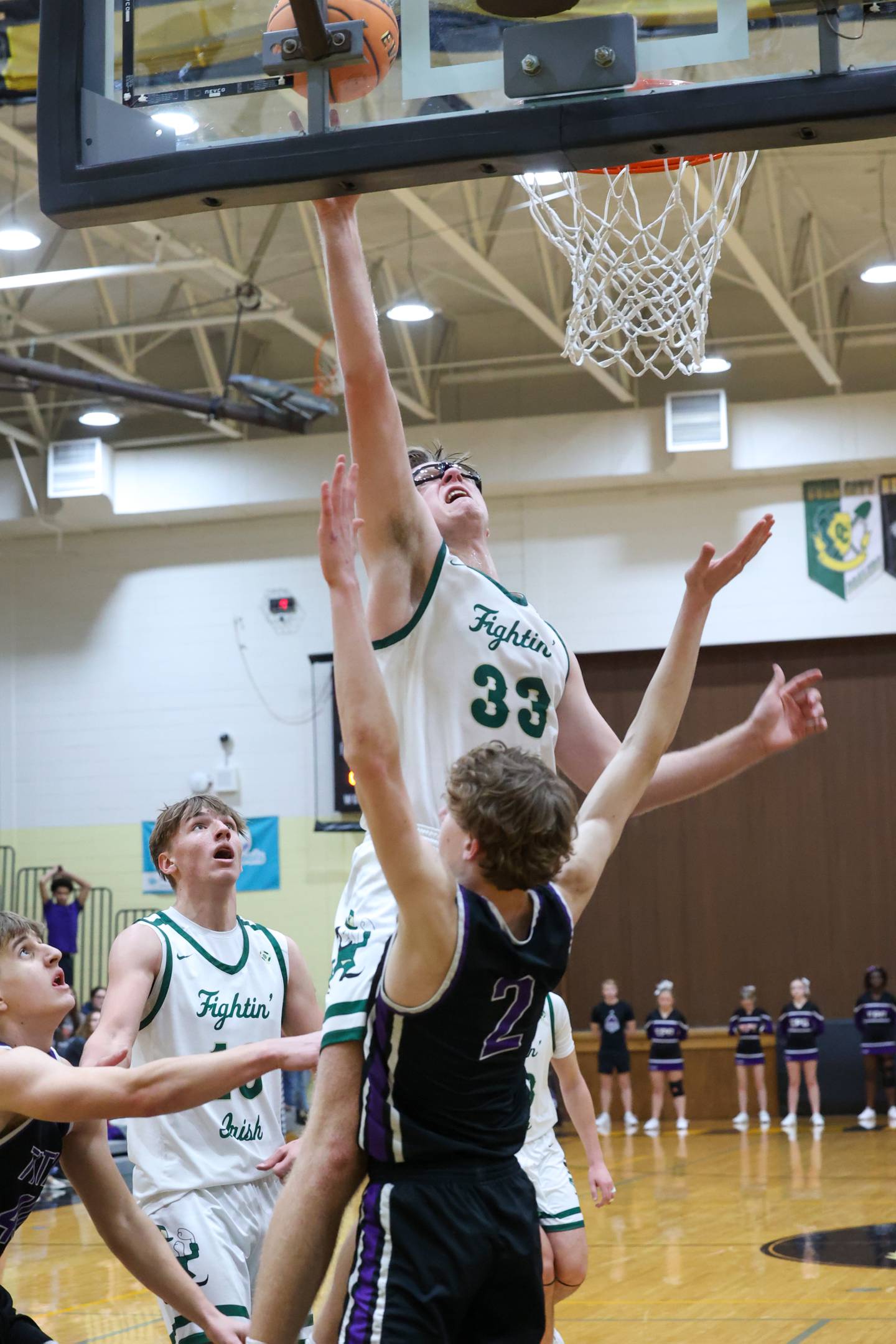 Bishop McNamara's Callaghan O'Connor puts in a layup during the Fightin' Irish's 66-52 victory over El Paso-Gridley in the IHSA Class 2A Herscher Regional championship on Friday, Feb. 27, 2026.