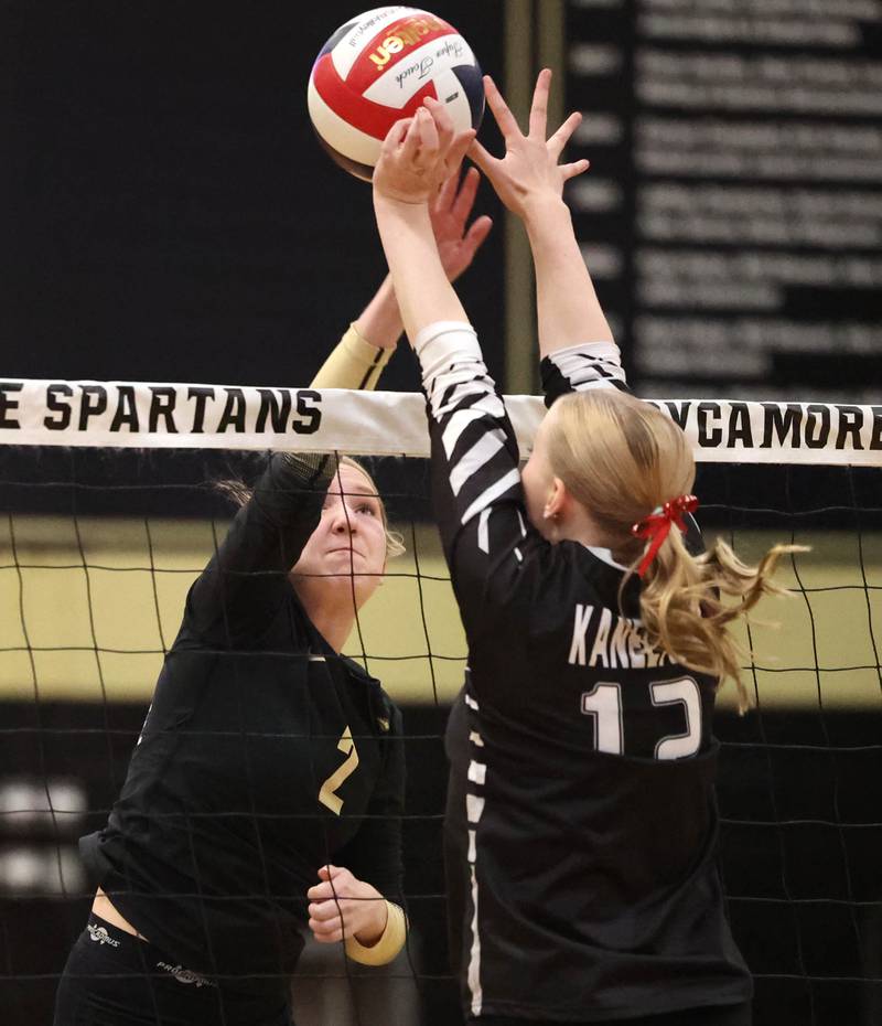 Sycamore's Madilyn Patton tries to get by the block of Kaneland's Haley Swim during their match Tuesday, Oct. 1, 2024, at Sycamore High School.