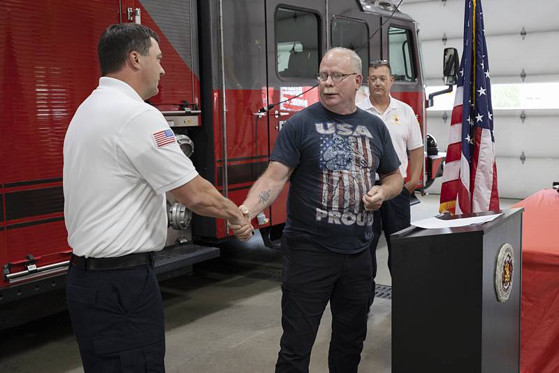 Dahlstrom (left) helped stem the blood flow from an accidental self-inflicted gunshot Schiefelbein suffered.