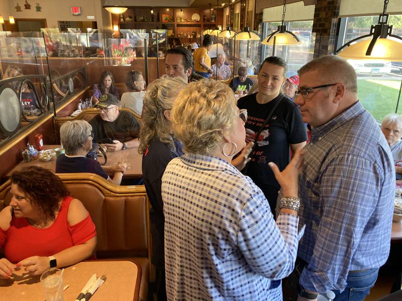 Republican candidate for governor, Darren Bailey, meets with potential voters Wednesday, Sept. 21, 2022, at Around the Clock Restaurant in Crystal Lake.