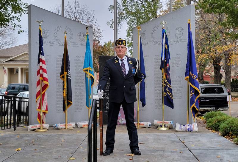 Ottawa veteran Mike Harden takes his post, the first of 96 veterans to take part in the 15th annual Honor Guard Vigil at Washington Square on Friday.