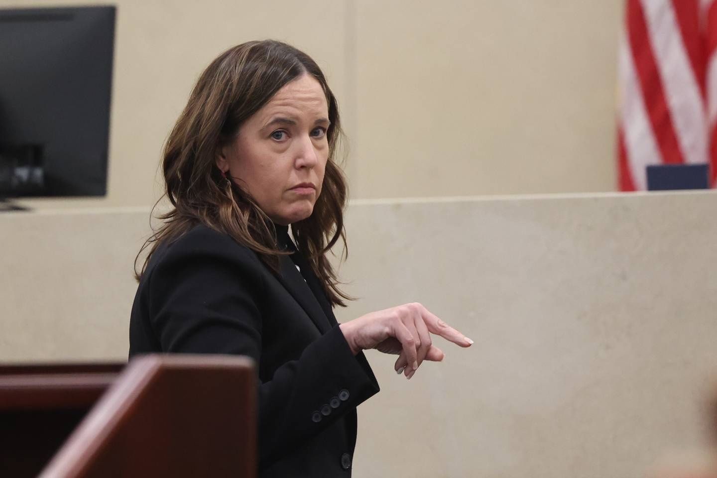 Will County Assistant State's Attorney Tricia McKenna talks with her team before the start of the trial of Jermaine Mandley, 47, of Bolingbrook, at the Will County Courthouse on Thursday, Aug. 17, 2023 in Joliet. Mandley is on trial for the alleged shooting of Maya Smith, 24, in June 2022.