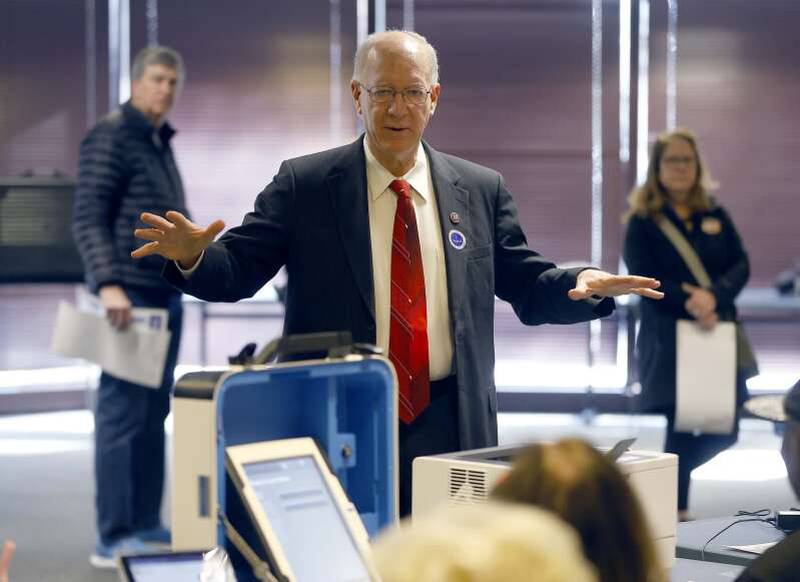 Democratic U.S. Rep. Bill Foster thanks poll workers for their efforts Tuesday morning in his hometown of Naperville.