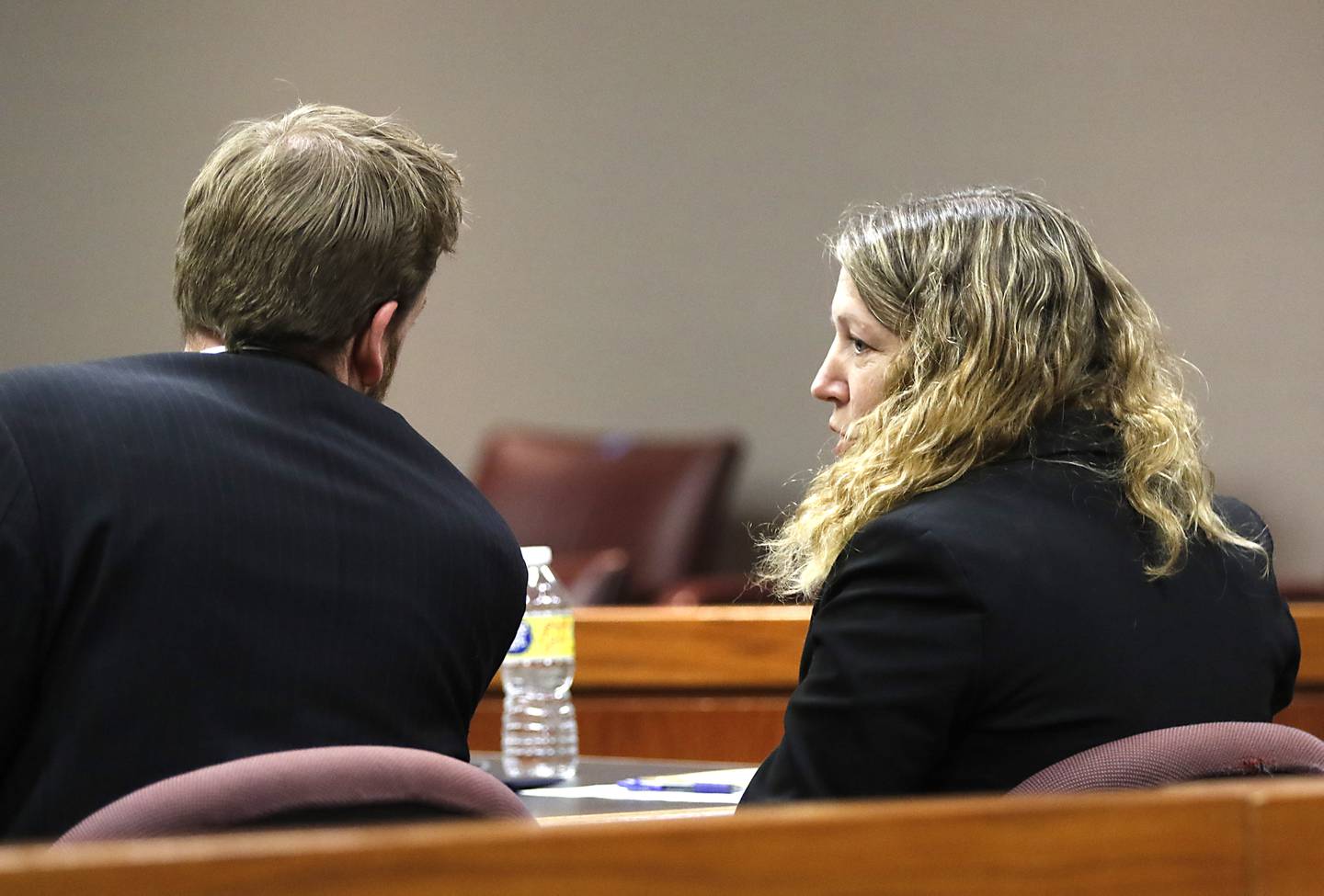 State's attorneys Tyler Mikan and Sharyl Eisenstein talk Monday, Nov. 14, 2022, during the trial of Robert J. Gould, 56, before Judge Michael Coppedge. Gould, who was on McHenry County’s most wanted list when arrested in 2017, is accused of repeatedly sexually abusing two children throughout their childhoods beginning in 2001.