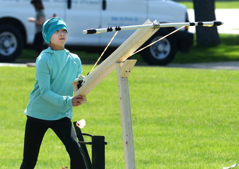 Oregon sixth grader Kaileena Pham aims her ballistic catapult on Friday, May 9, 2025.