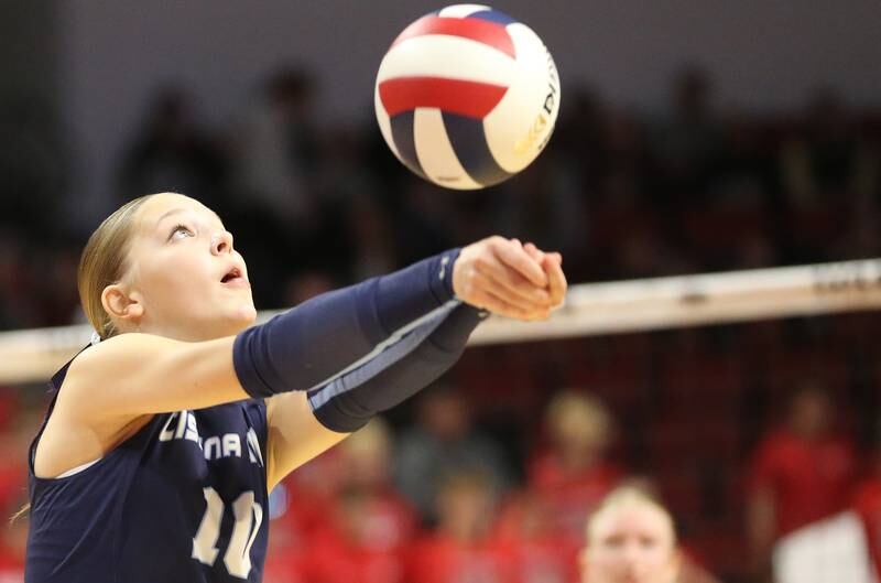 Cissna Park's Kendyl Neukomm returns a serve from Calhoun during the Class 1A State semifinal game on Friday, Nov. 15, 2024 at CEFCU Arena in Normal.