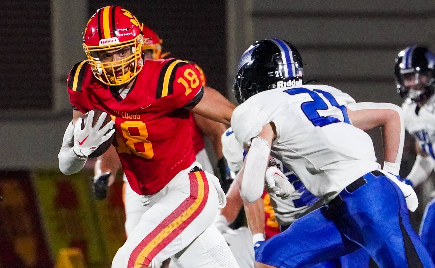 Batavia’s C.J. Valente (18) runs after the catch for a large gain late in the 4th quarter of play against Lincoln-Way East during a football game at Batavia High School on Friday, Sep 1, 2023.