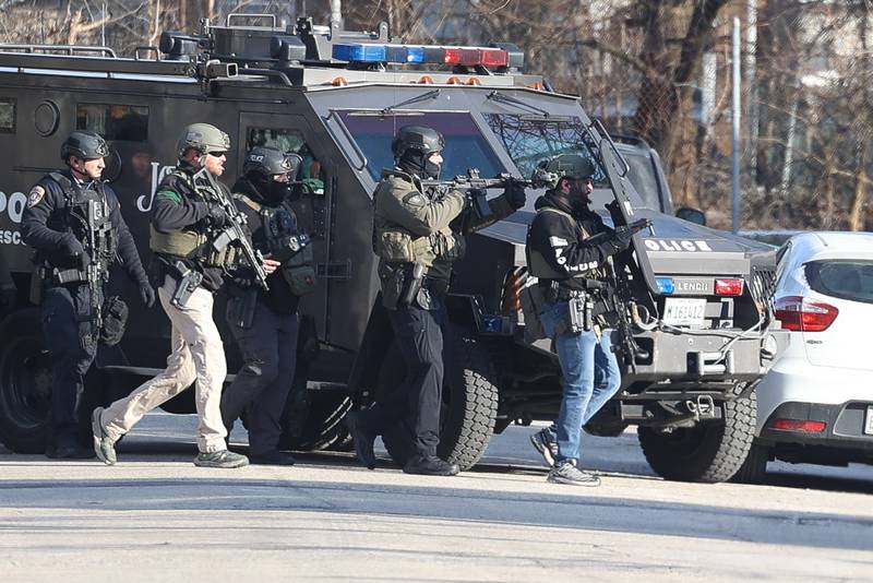 Joliet police head into a home along the 500 block of Irving Street during a standoff on Thursday, Jan. 9, 2025 in Joliet.