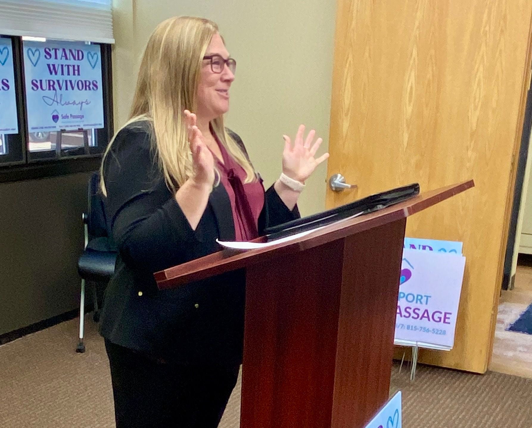 Rebecca Versluys, executive director of Safe Passage Inc. in DeKalb, speaks on Friday, Dec. 5, 2025, at a groundbreaking ceremony for the crisis shelter's new building. Construction at 217 Franklin St., is expected to begin in the spring.