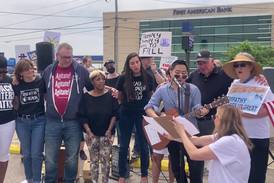 "No Kings" protest in Joliet performance of "This Land is Your Land"