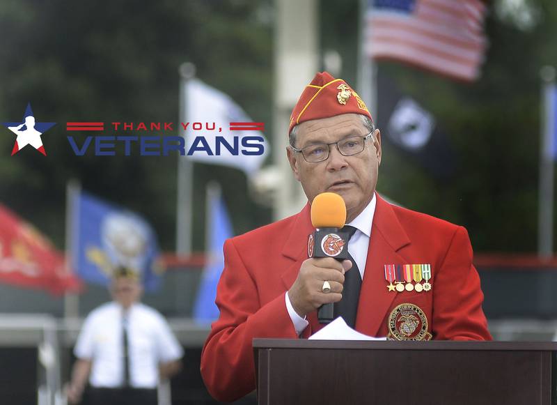La Salle County States Attorney Joe Navarro speaks to the crowd Saturday, Aug. 26, 2023, at Veterans Memorial Park in Peru during a ceremony honoring those who died in the Vietnam conflict. The Vietnam Traveling Memorial Wall was set up in Peru over the weekend.