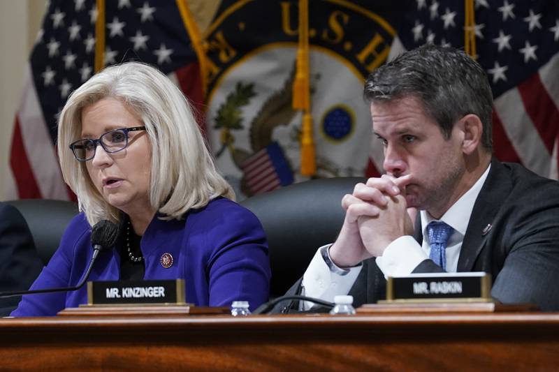 FILE - Rep. Liz Cheney, R-Wyo., and Rep. Adam Kinzinger, R-Ill., listen as the House select committee tasked with investigating the Jan. 6 attack on the U.S. Capitol meets on Capitol Hill in Washington, Oct. 19, 2021. Republican Party officials have voted to punish Cheney and Kinzinger and advanced a rule change that would prohibit candidates from participating in presidential debates organized by the Commission on Presidential Debates. GOP officials took a voice vote to approve both measures at the Republican National Committee’s winter meeting in Salt Lake City. (AP Photo/J. Scott Applewhite, File)