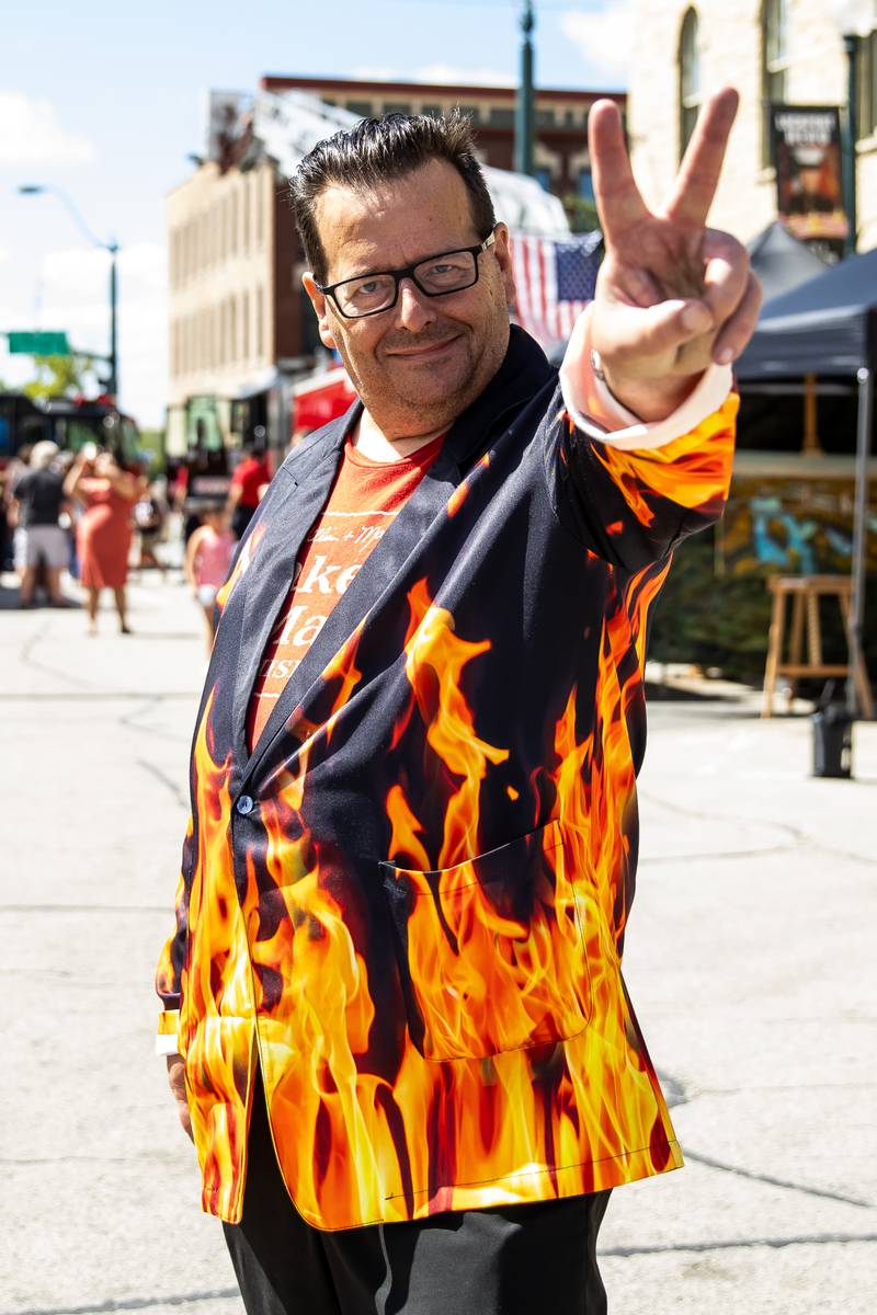 Kevin Traynor, the artist who created the Lockport Fire inspired chalk mural on display in The Gaylord Building through Sept. 24, shares good vibes during Fire Fest on August 10, 2024.