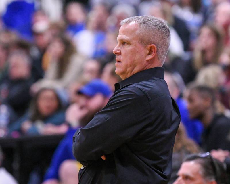 Wheaton Warrenville South's head coach Mike Healy looks on during the game on Friday Feb. 6, 2026, while taking on Wheaton North held at Wheaton Warrenville South High School.
