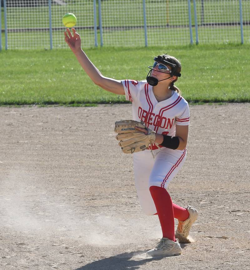 Oregon's Lola Schwarz throws to first for an out after fielding a ground ball against Somonauk at the 2A Oregon Regional on Wednesday, May 20, 2026.