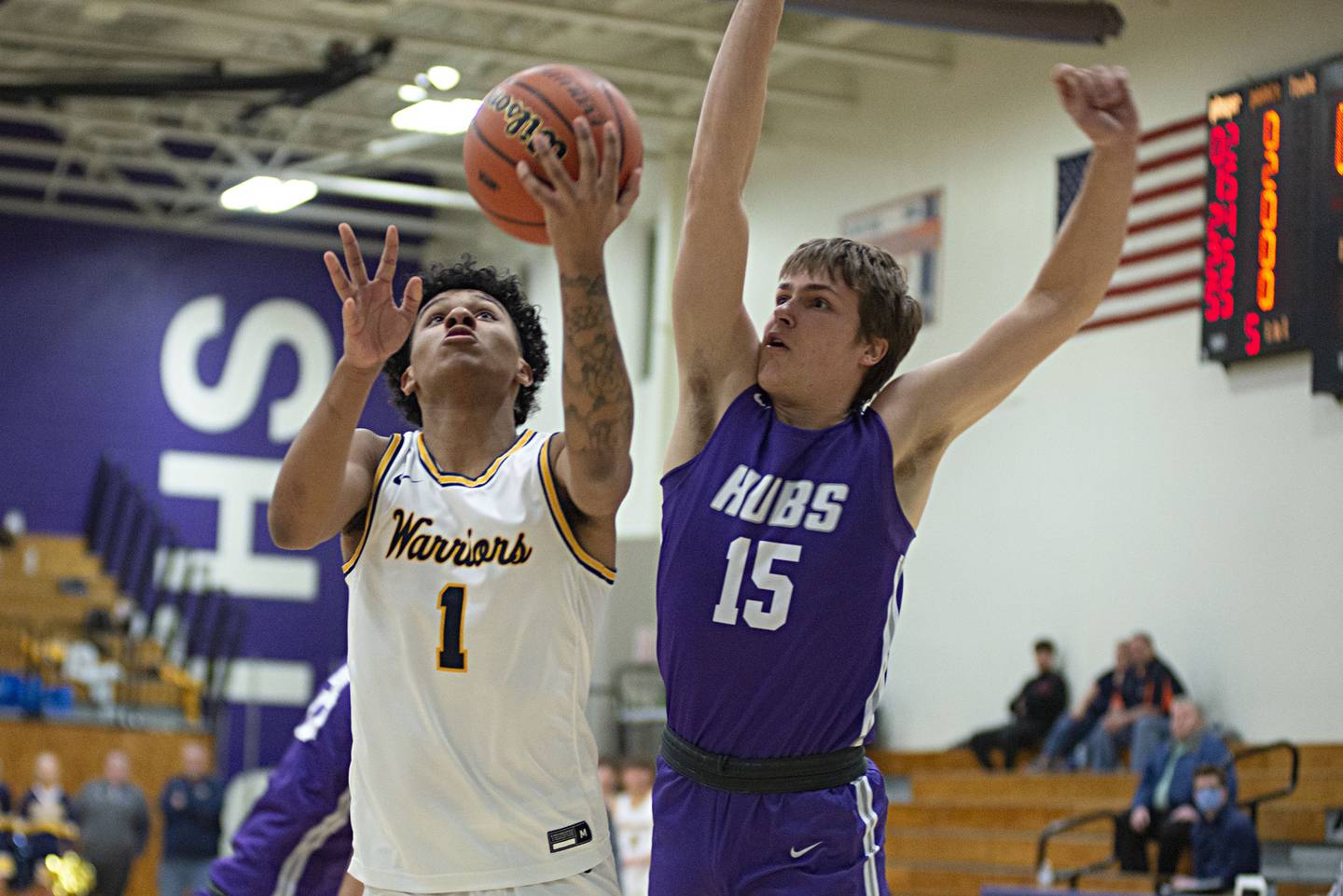 Sterling's Tyree Kelly puts a shot up against Rochelle's Tanner Lager in the regional finals Friday, Feb. 25, 20212.