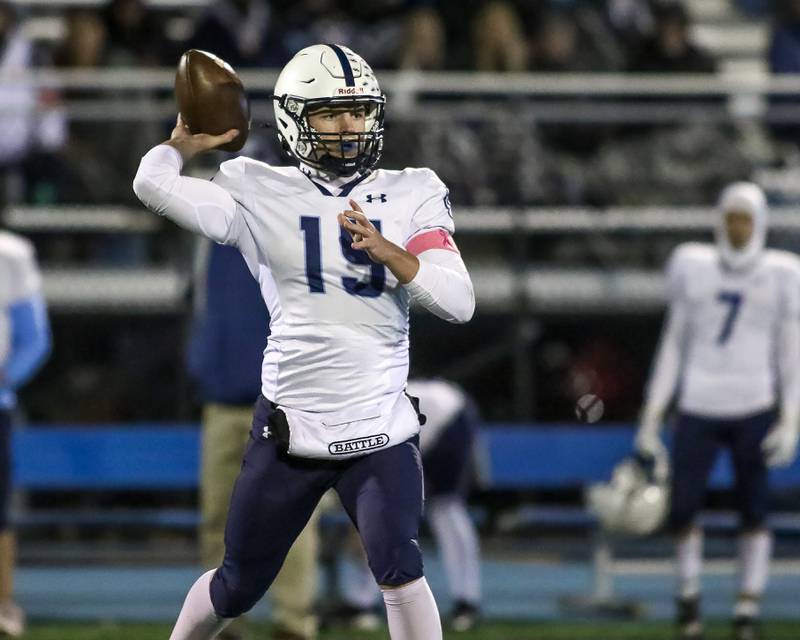 Plainfield South's Cody Hogan (15) throws a short pass during Class 8A Playoff football game between Plainfield South at Downers Grove South on Friday, Nov 1, 2024  in Downers Grove.