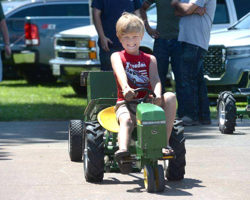 Tristan Kozemski, 9, of Hooppole, competes in the pedal tractor pull at Hooppole Fun Day on Saturday, June 28, 2025.