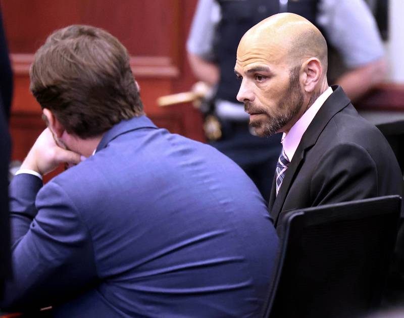 Nathan P. Sweeney, (right) 45, of DeKalb, talks to his attorney John Kopp Thursday, June 26, 2025, during his plea hearing at the DeKalb County Courthouse in Sycamore. Sweeney pleaded guilty Thursday for driving under the influence on March 28, 2024, and causing a crash that killed DeKalb County sheriff‘s deputy Christina Musil.