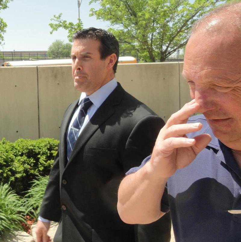 Nick Crowley leaves the Will County Courthouse on Wednesday, May 16, 2018, in Joliet, Ill.