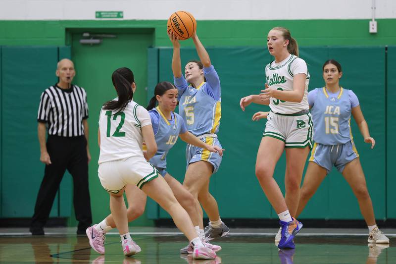 Joliet Catholic’s Callan Kinsella gets the turnover against Providence on Saturday, Dec. 5, 2025 in New Lenox.
