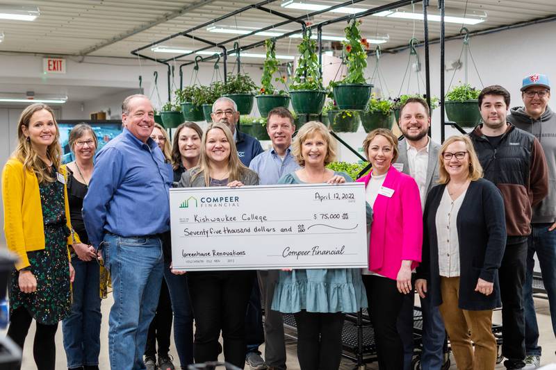 Representatives from Compeer Financial presented Kishwaukee College with a $75,000 Agriculture & Rural Initiative Grant at the college’s greenhouse facilities. Pictured (from left) are Kayte Hamel, executive director of the Kishwaukee College Foundation; Catherine Marsh, adjunct assistant professor, horticulture; Mark Ringhouse, Compeer Financial officer; Kim Rotella, greenhouse grounds specialist; Amy Newell, Compeer Financial officer; Karen Schieler, senior corporate giving specialist, Compeer; Rich Alde, assistant professor, horticulture; Dan Crary, regional vice president of core markets, Compeer; Laurie Borowicz, president of Kish College; Jessica Berek, dean of instruction; Chase Budziak, dean of instruction; Janet Gallagher, associate professor, horticulture; Michael Dean, Kish horticulture student; and Andrew Goncher, Kish horticulture student.