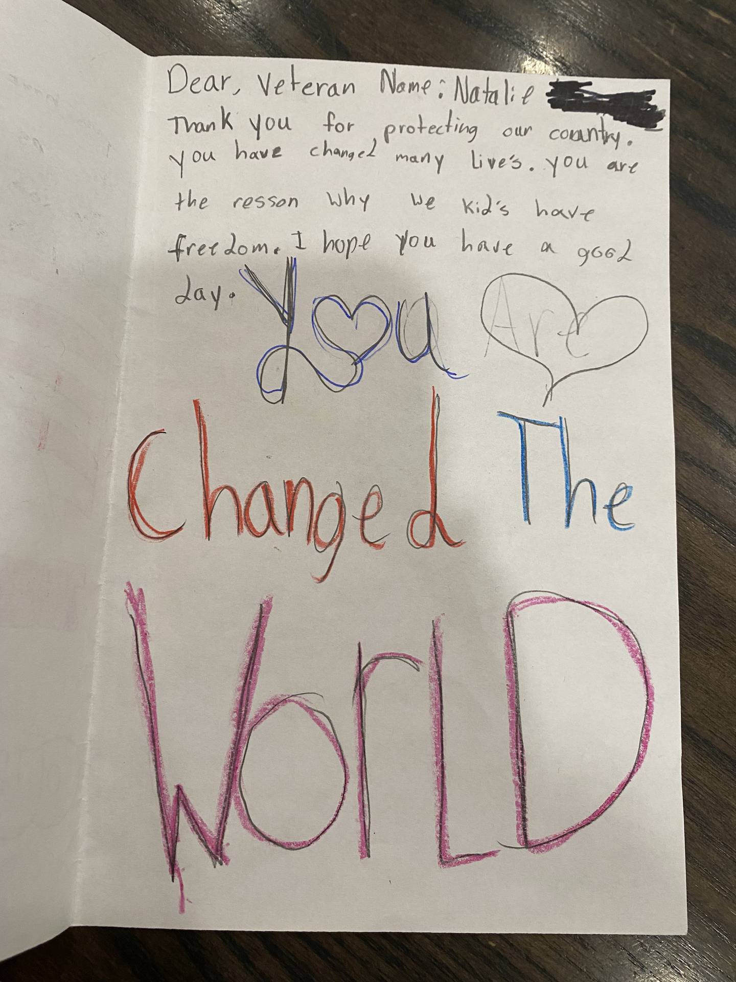 A handwritten greeting card from a student named Natalie, who in the letter thanked Army veteran Jerry Smith for his service during the Vietnam War. Smith and more than 100 other veterans were treated to pomp and circumstance during an Aug. 20, 2025, Honor Flight Chicago tour of Washington D.C.