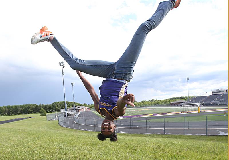 Mendota's Mariyah Elam does a flip in mid air on Tuesday, May 28, 2024 at Mendota High School. Elam is the NewsTribune girls track athlete of the year.