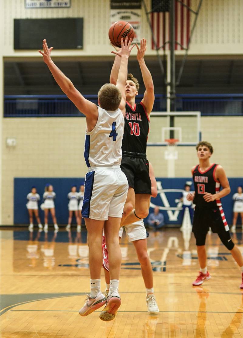 Batavia’s Nate Nazos (10) shoots the ball over Geneva’s Brady Kafka (4) during a basketball game at Geneva High School on Friday, Dec 15, 2023.