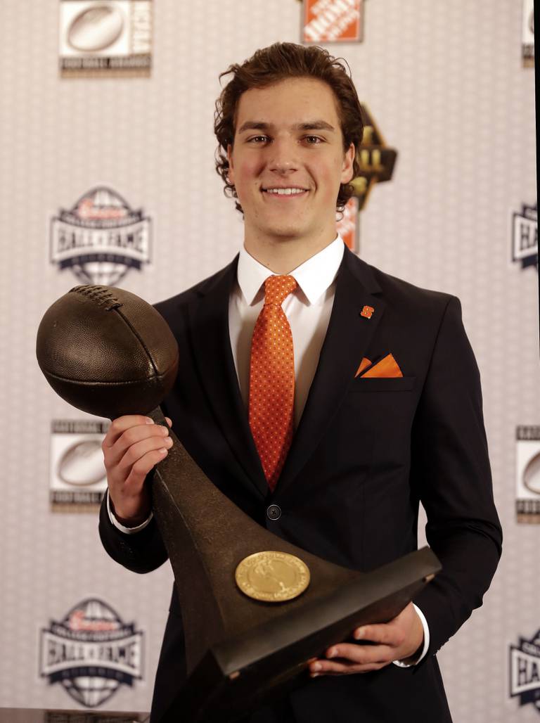 Andre Szmyt poses with the trophy after winning the Lou Groza Award for being the best place kicker in college football during the 2018 season.