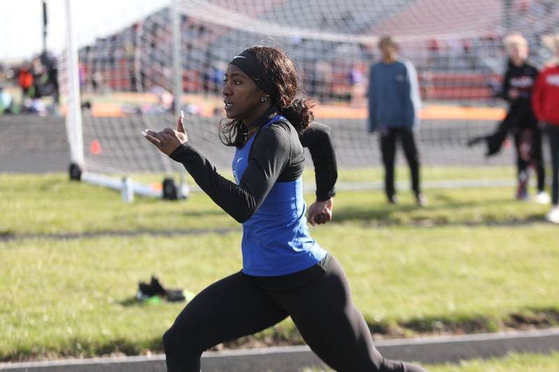 Lincoln-Way East’s Mariam Azeez takes off on one of her long jumps at the Minooka track invitational. Thursday, April 14, 2022, in Minooka.